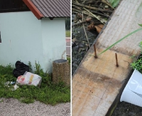 INTERWENCJA: Rozrzucone śmieci i gwoździe wystające z deski. Wszystko tuż obok wizytówki gminy (ZDJĘCIA)